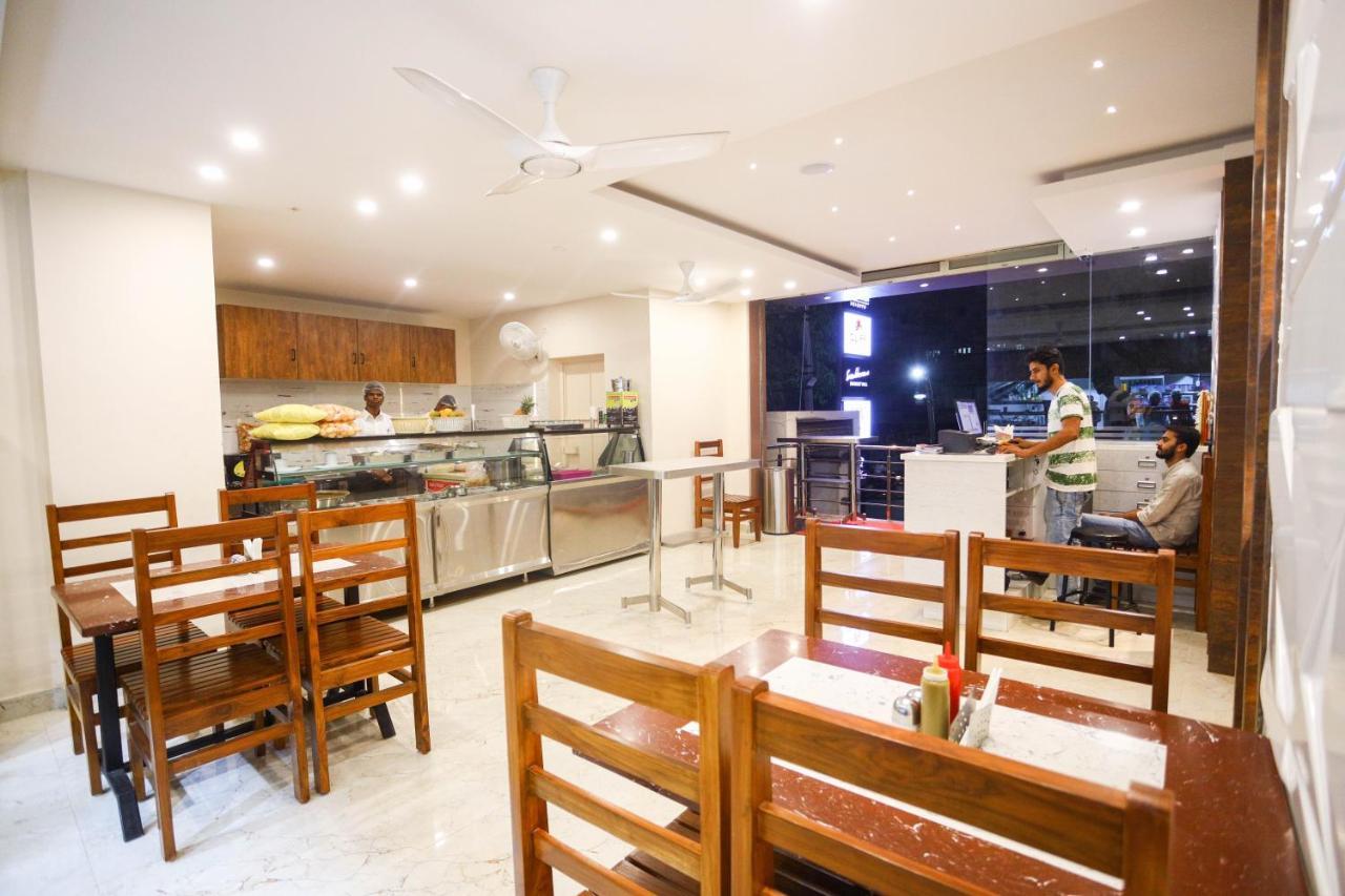 Cliff Embassy Banquet And Suites Shimoga Buitenkant foto
